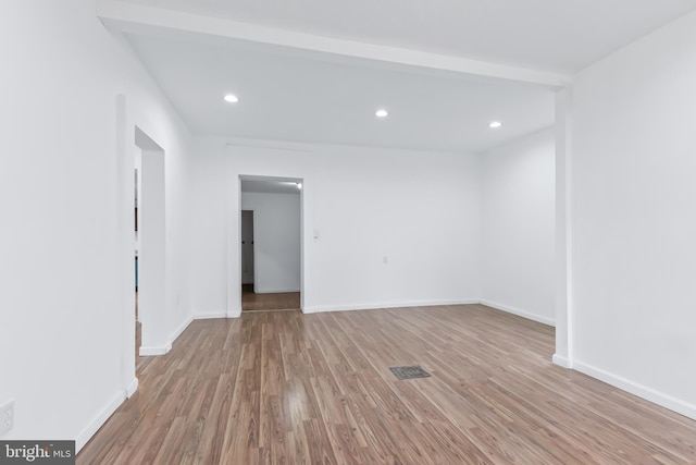 unfurnished room featuring light wood-type flooring