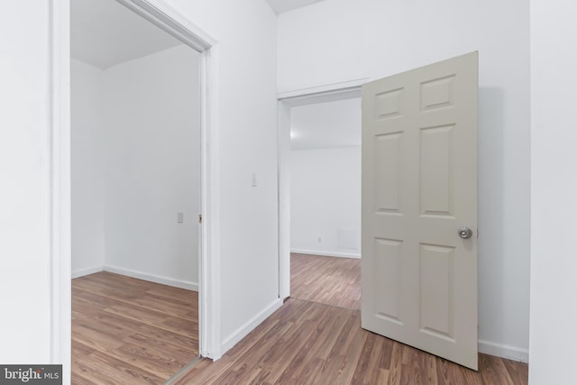 hall featuring hardwood / wood-style flooring