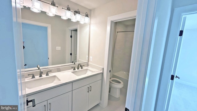 full bathroom with tile patterned floors, bathtub / shower combination, toilet, and vanity