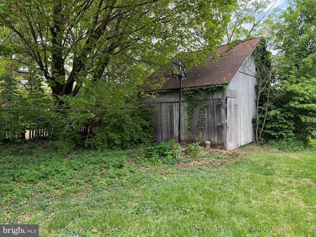 exterior space featuring an outdoor structure