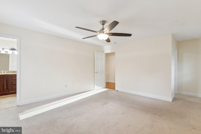 unfurnished room with light carpet and ceiling fan