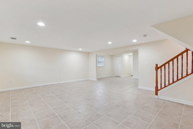 basement with light tile patterned floors