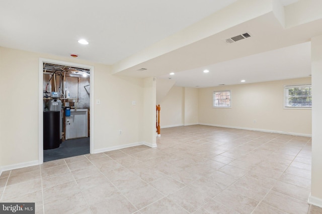 basement with light tile patterned floors