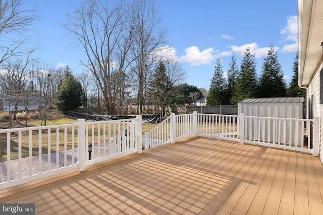 deck featuring a storage shed