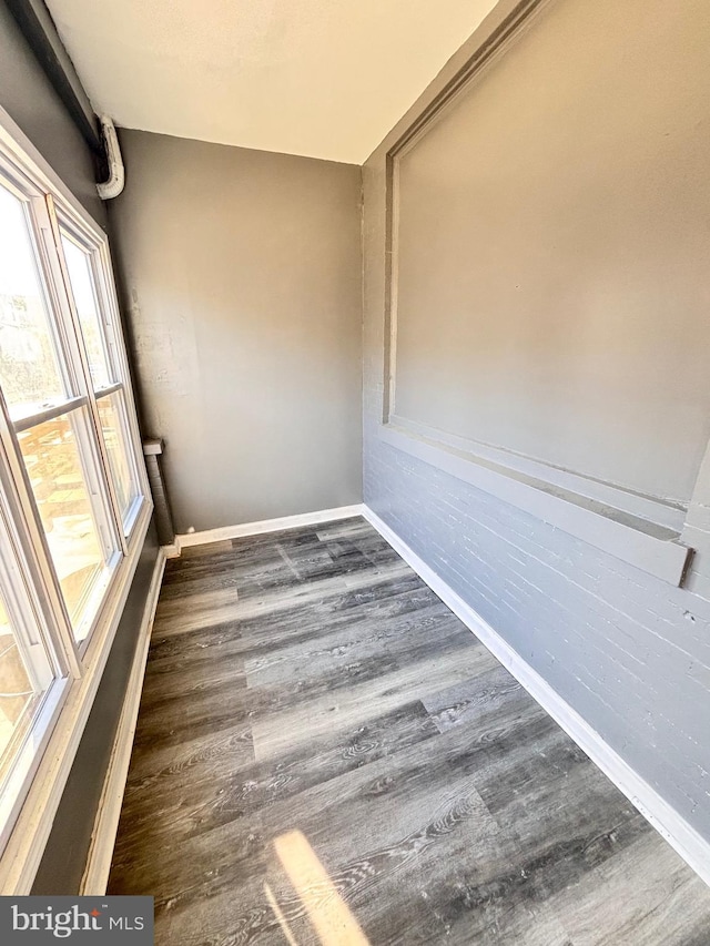 interior space with dark hardwood / wood-style floors