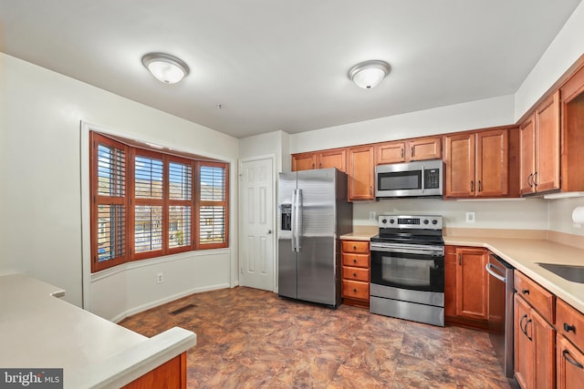 kitchen featuring sink and appliances with stainless steel finishes