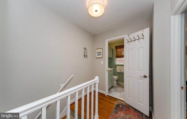 hallway featuring hardwood / wood-style flooring