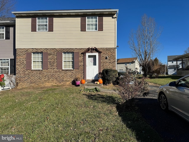 view of front of house with a front lawn