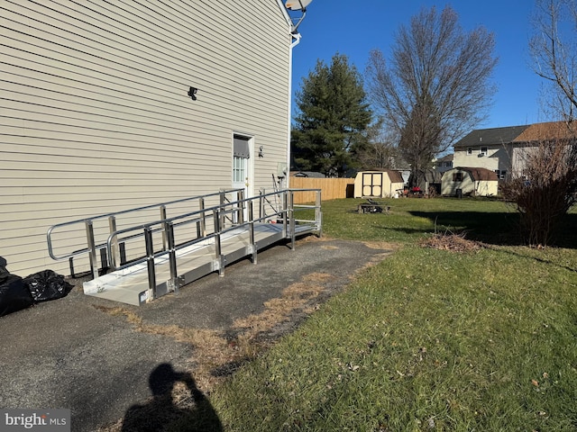 view of yard with a storage shed