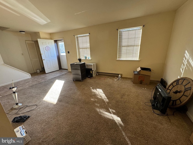 entryway with carpet floors and a baseboard radiator