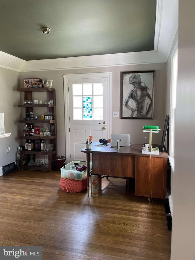 office area featuring ornamental molding and dark wood-type flooring