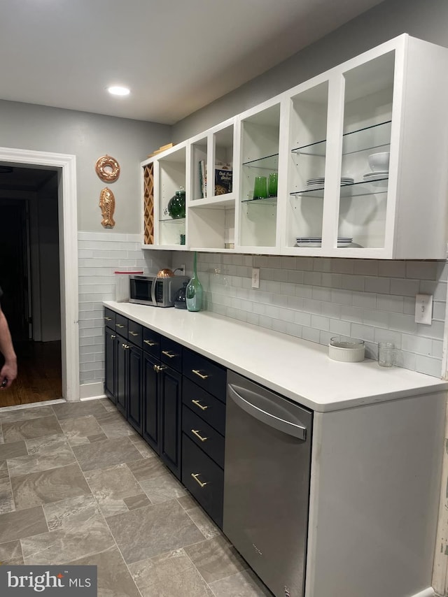 kitchen with white cabinets and stainless steel dishwasher