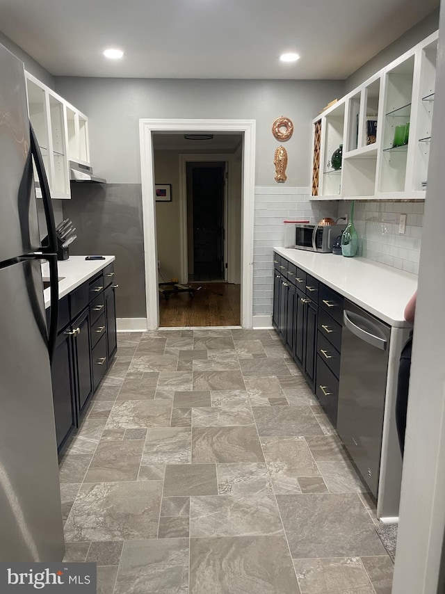 kitchen featuring white cabinets and appliances with stainless steel finishes