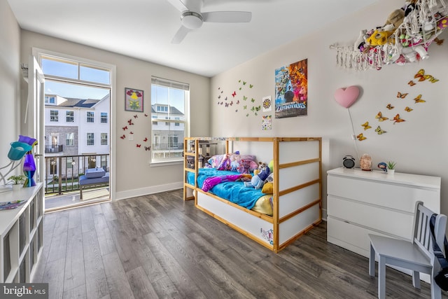 bedroom featuring access to exterior, ceiling fan, and dark hardwood / wood-style flooring