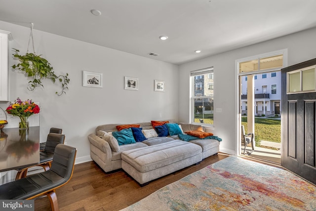 living room featuring dark hardwood / wood-style floors