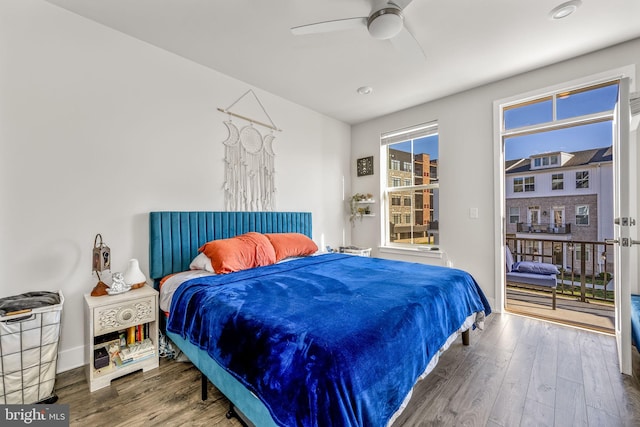 bedroom with hardwood / wood-style floors and ceiling fan