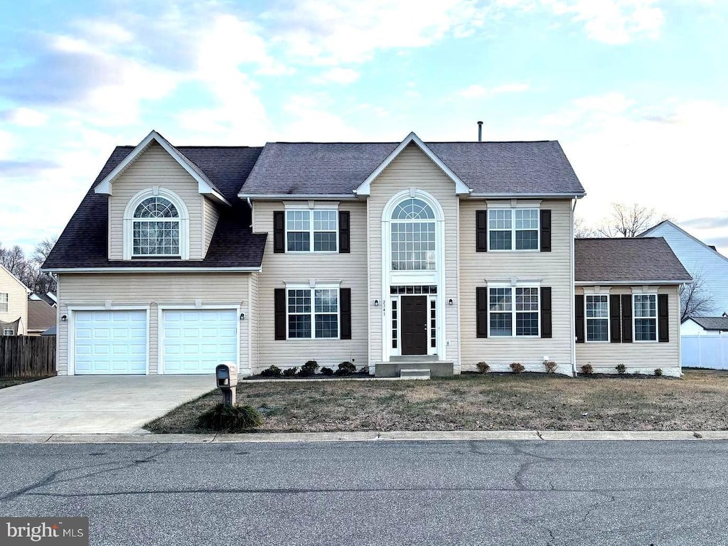 colonial home featuring a garage