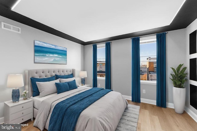 bedroom featuring light wood-type flooring