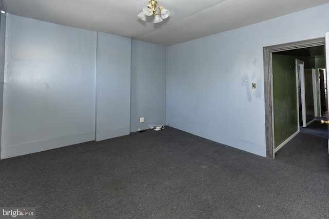1137 Sycamore St, Camden, NJ 08103 - empty room with dark colored carpet