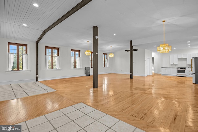 interior space with beamed ceiling and an inviting chandelier