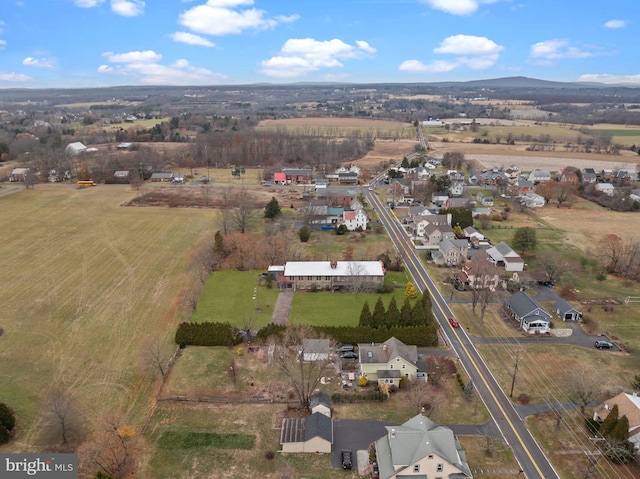 drone / aerial view featuring a mountain view