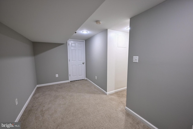 additional living space with light carpet