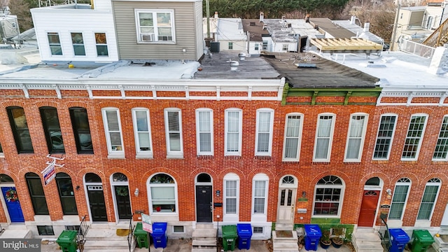 exterior space featuring central AC unit