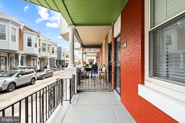 balcony featuring covered porch