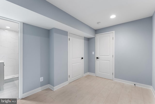 basement with light wood-type flooring