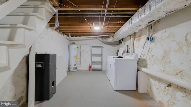 basement featuring washer and dryer and gas water heater