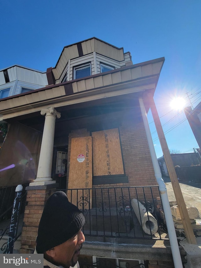 exterior space featuring covered porch