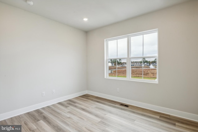 empty room featuring light hardwood / wood-style floors