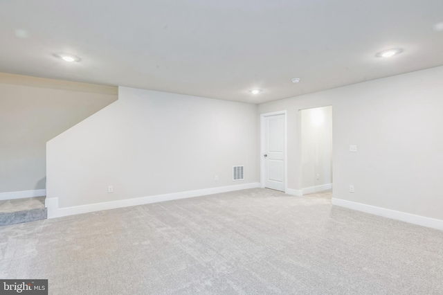 basement with light carpet