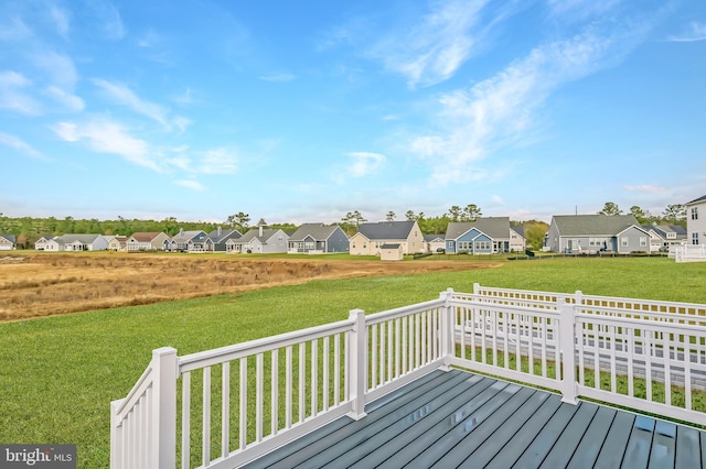 deck featuring a yard