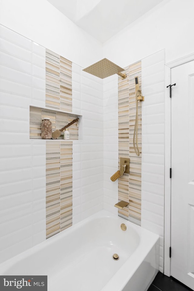 bathroom with shower / washtub combination