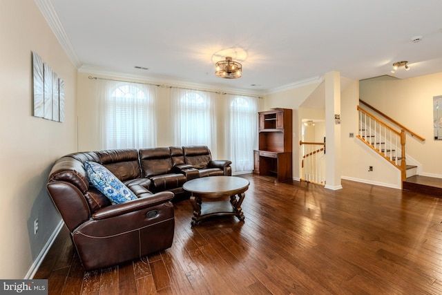 living room with dark hardwood / wood-style floors and ornamental molding