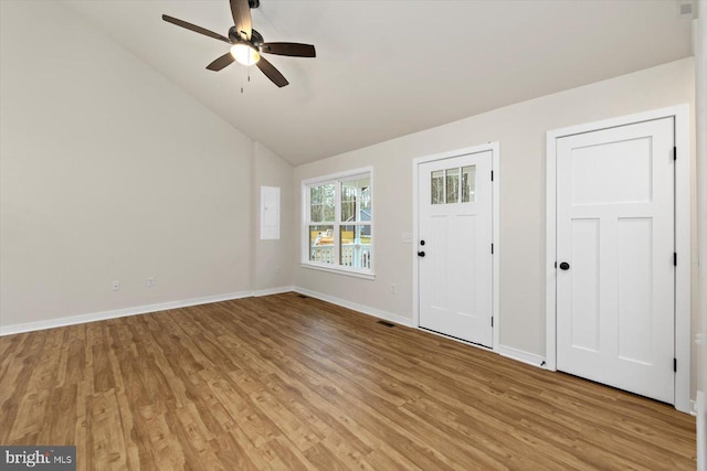 entrance foyer featuring ceiling fan, light hardwood / wood-style flooring, and lofted ceiling