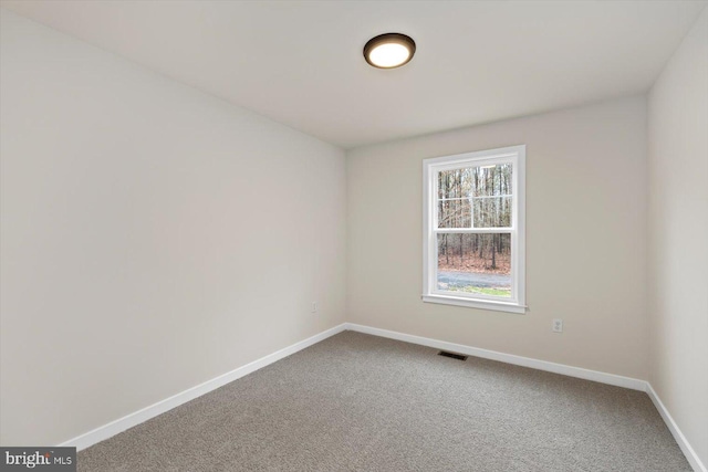 view of carpeted spare room