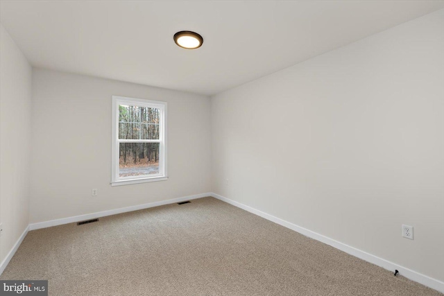 view of carpeted spare room