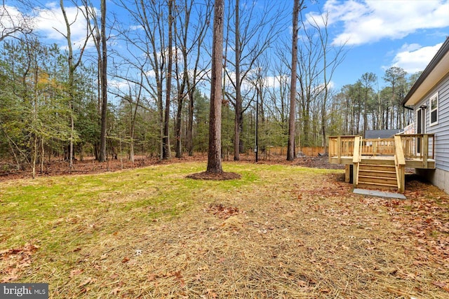 view of yard featuring a deck