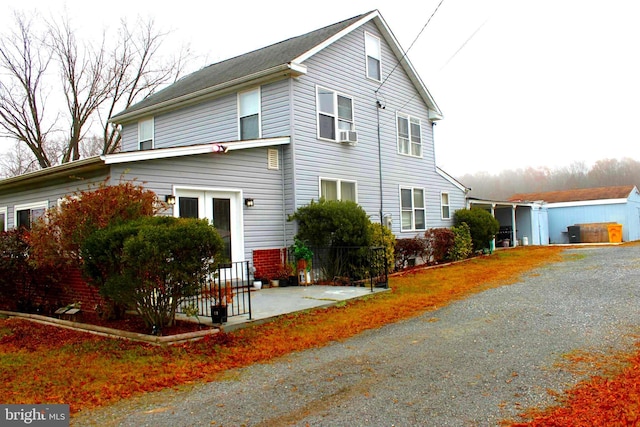 view of front of house with cooling unit