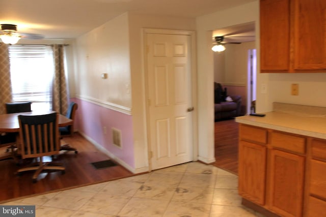 dining room featuring ceiling fan