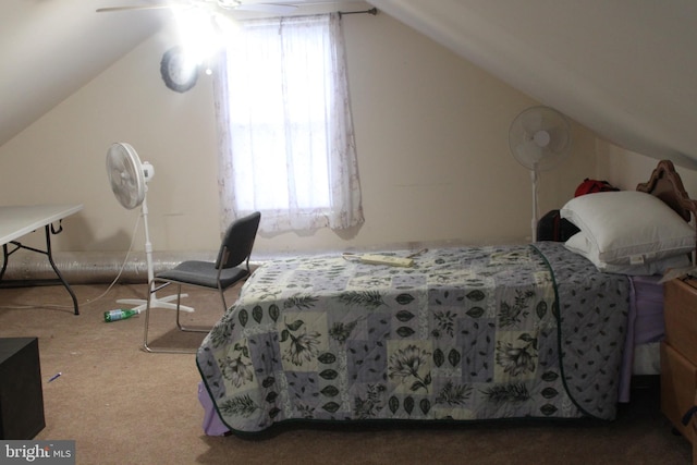 carpeted bedroom featuring ceiling fan, lofted ceiling, and multiple windows