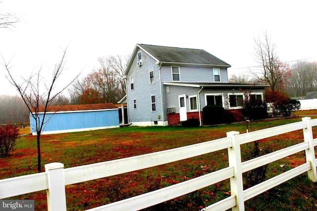 view of property exterior featuring a lawn