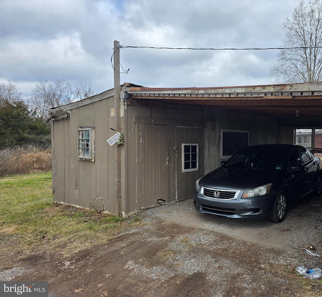 exterior space featuring a carport