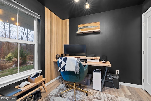 office area with wood-type flooring