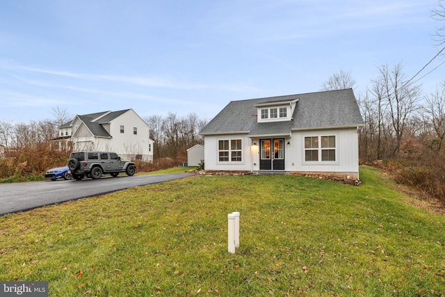 view of front of house with a front lawn