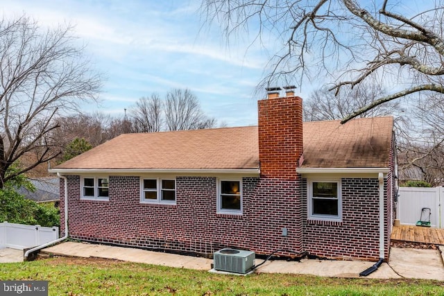 view of property exterior with central AC unit