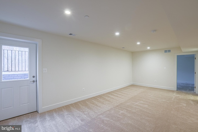 unfurnished room featuring recessed lighting, visible vents, light carpet, and baseboards