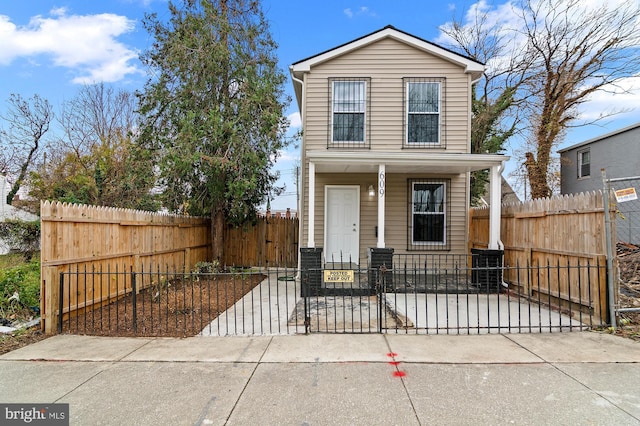 view of front property featuring covered porch